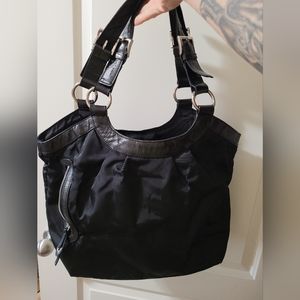 Black handbag- doesn't seem to have a brand